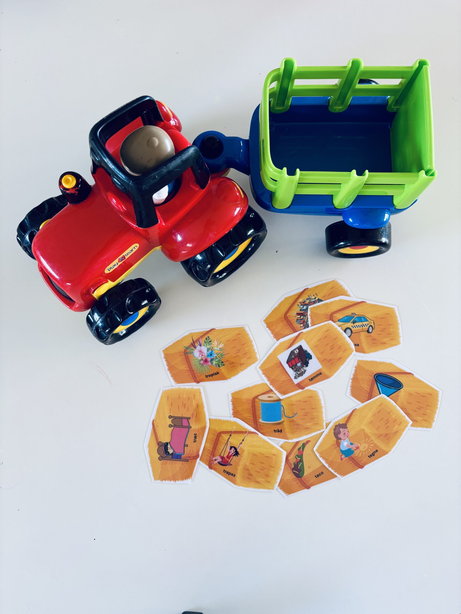 Traktoren løfter tunge /t/-lyde