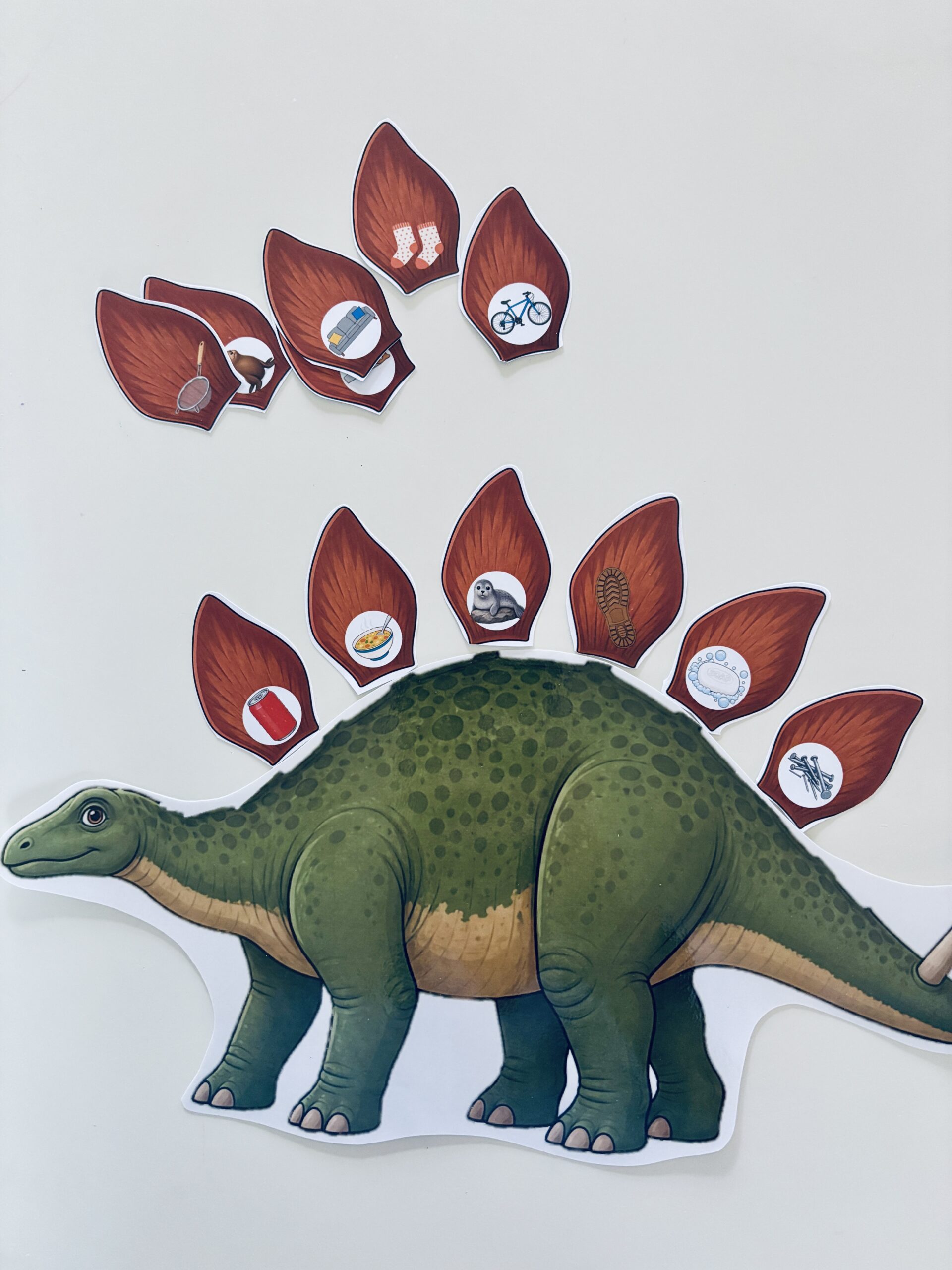 Hjælp stegosaurus! Træning af /s/-lyd, /s/-klynger og automatisering af svære lyde